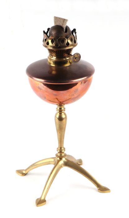 An Arts & Crafts Benson copper and brass oil lamp, stamped 'Benson' to one foot, 29cms high.