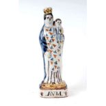 A 19th century Delft Virgin Mary and Child group, 24cms high.