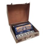 A Marcus piano accordion, cased.