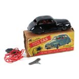 A Chad Valley remote control car, boxed, 19cms long.