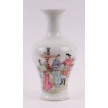 A Chinese baluster vase decorated with figures in a landscape, six character mark to base, 25cms