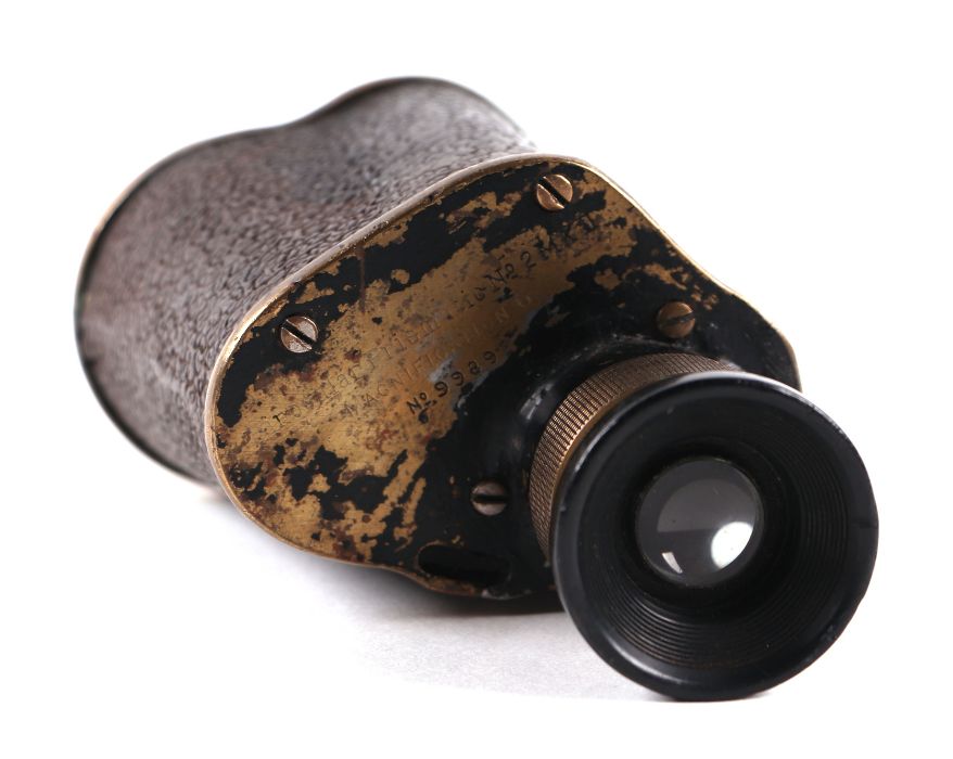 A WWI military brass monocular.