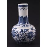 A Chinese blue & white bottle vase with six character blue mark to the underside, 22cms high.