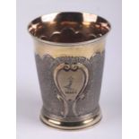 A small Georgian silver gilt beaker with armorial crest, London 1796 and maker's mark for Peter &