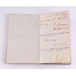 An autograph book belonging to Master Shipbuilder Oliver Lang, signatures cut from letters stuck