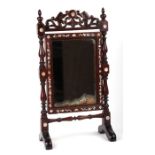 A late 19th / early 20th century Chinese hardwood swing table top vanity mirror inlaid with mother