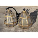 A large pair of outdoor wall lamps of octagonal form, overall 74cms high (2).