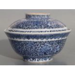 A Chinese blue & white rice bowl and cover, six character mark to both, 15cms diameter.Condition