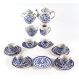 A late 19th century Staffordshire blue & white Mr Punch pattern nursery tea set, 21 pieces.