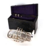 A Ball Beavon & Co. silver plated cornet in original painted pine carry case.