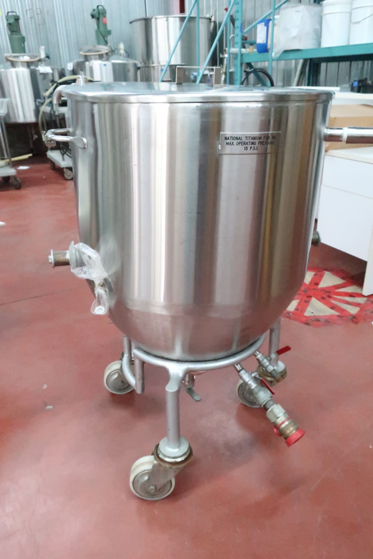 stainless steel tank. 304 double jacket 15 psi of 120 kg capacity on removable rolling base.
