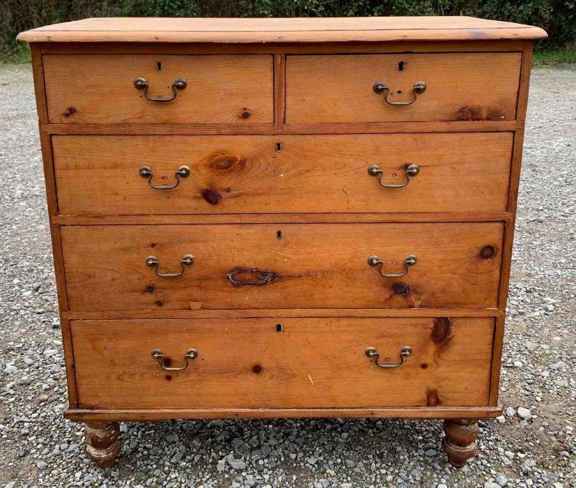 A Victorian pine chest of two short and three