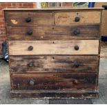 A Victorian pine chest of two short and four long gradu