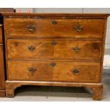 A 19th century walnut and mahogany chest of drawer