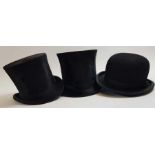 Two black top hats, 16cm wide and 19.8cm high, 14.