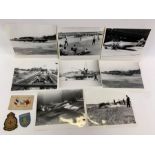 A collection of WWII black and white photographs o