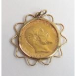 A King Edward VII 1910 gold half sovereign in mount