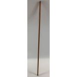 A wooden measuring stick made by Critchley Brother