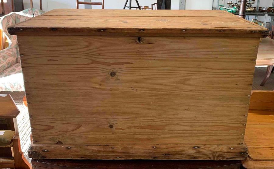 A Victorian pine blanket box, with iron swing hand