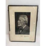 A framed photographic print of a portrait of Edwar
