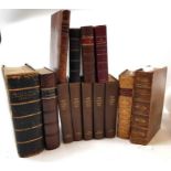 A collection of leather bound books to include Dom