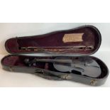 An early 20th century apprentice violin, in ebonis