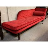 A 20th century chaise longue, upholstered in a red