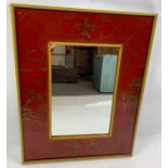A 20th century red chinoiserie mirror, with a gilt