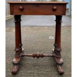 A Victorian mahogany table on stand, with turned f