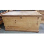 A Victorian pine blanket box, with brass swing han