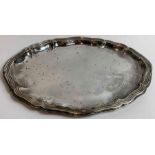 A German silver dish, of ovoid form with fluted ed