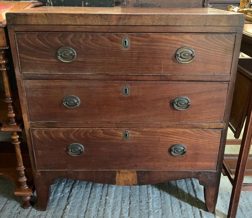 A 19th century mahogany chest of three long