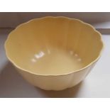 A Wedgwood yellow glazed bowl, by Keith Murray, 22