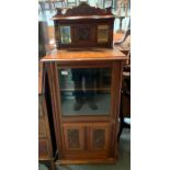 Glazed front mahogany music cabinet