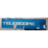 Telescope with achromatic coated lens