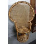 A mid century/vintage wicker peacock chair