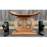 A vintage African wooden tribal birthing stool,