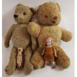 A vintage straw filled jointed teddy bear, set wit