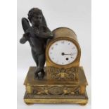 A 20th century French mantel clock decorated in re
