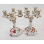 A pair of Herend four branch candlesticks, each pa