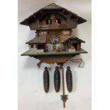 A Swiss cuckoo clock with musical movement