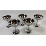 A set of five silver plated champagne coupes