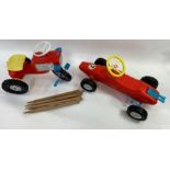 New/old stock - A boxed model racing car, along wi