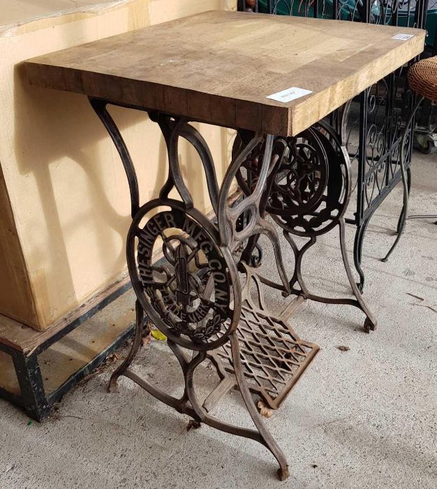 SInger iron treadle base table with oak top