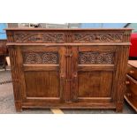 Carved oak sideboard