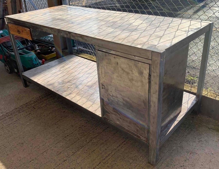 Large industrial metal workshop workbench