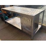 Large industrial metal workshop workbench