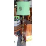 Oriental style brass standard lamp with shade