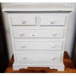 Miniature chest of drawers in distressed paint