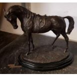 Bronze figure of a horse on wooden base